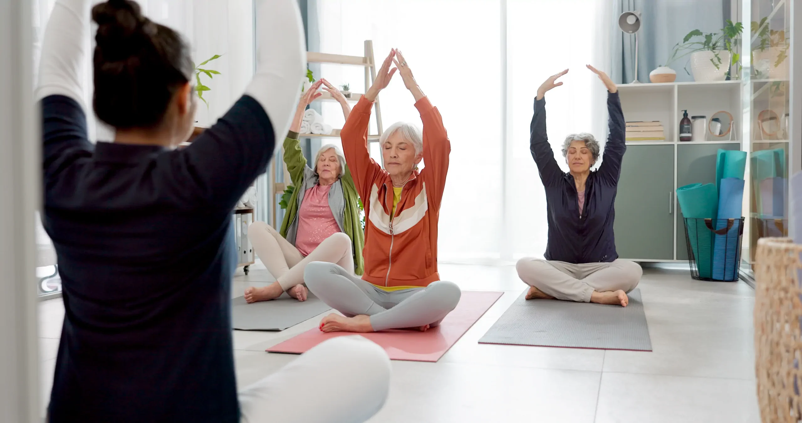 senior-people-yoga-class-and-coach-in-meditation-2025-04-05-22-52-43-utc
